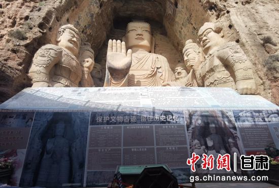 時下，中國“石窟鼻祖”天梯山石窟第13窟大佛足部與局部危巖體搶救性保護項目正在施工。圖為施工現(xiàn)場。陳曉斌 攝